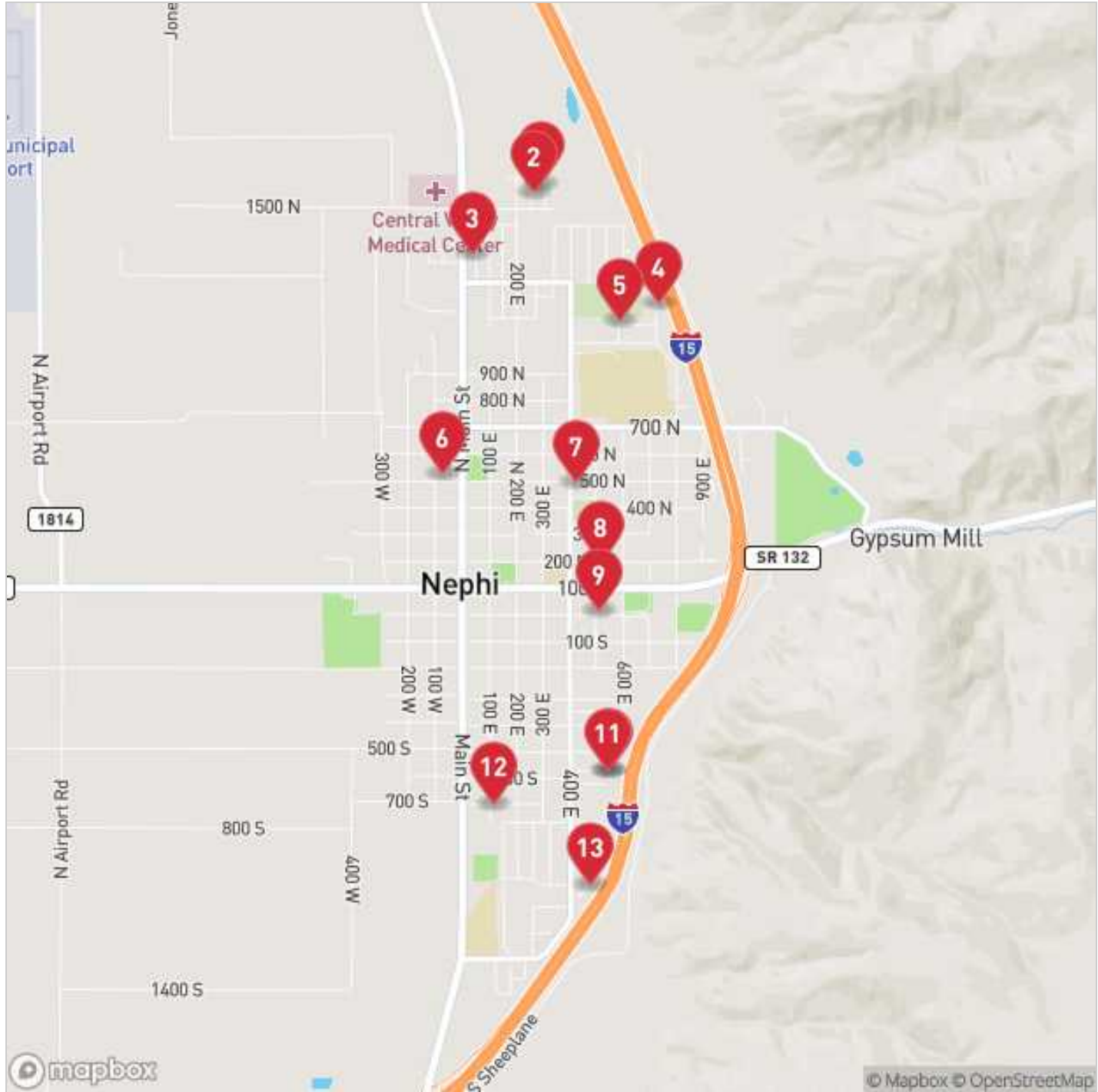 UtahRealEstate.com map showing 13 numbered sold-home locations across Nephi, Utah, including two excluded from the article's 11-sale calculations